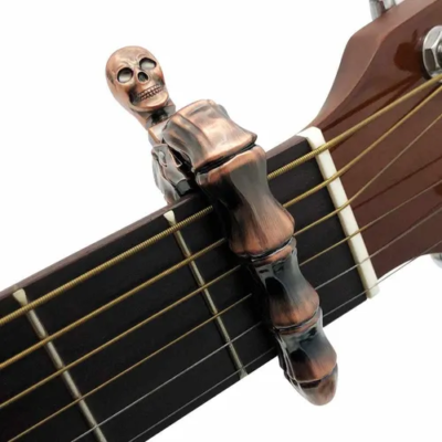 Capo Capotraste Para Guitarra Metal Diseno Hueso Calavera